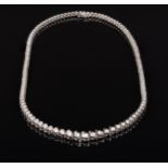 A diamond necklace set with one hundred and twenty-one diamonds.