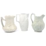 Stoneware Society of Arts jug, Harvest Barrel jug and a Tulip jug,