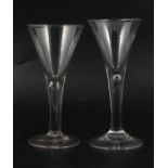 Two trumpet wine glasses,