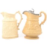 Stoneware Tam O'Shanter jug and a Wedding Scene jug,