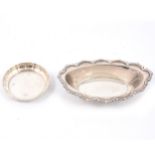 Silver navette shaped dish and a small coaster,