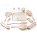 Matched silver dressing table set,
