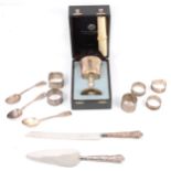 Commemorative silver goblet, napkin rings and cutlery,