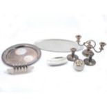 Silver-plated wares, stainless steel breakfast set and a white metal charger.