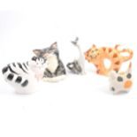 Royal Crown Derby cat paperweight, Beswick Siamese cat and other cat figures.