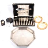Set silver-handled fish servers and eaters, plated tray, napkin rings, and other items.