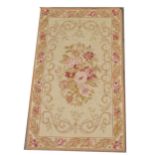 Small Aubusson rug.