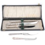 Three piece silver carving set, cake and cheese knives.