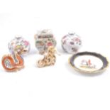 Royal Crown Derby paperweights, Royal Doulton character jugs and other decorative ceramics.