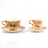 Two Royal Worcester cabinet cups and saucers.