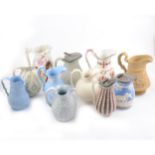 Eleven assorted Victorian relief-moulded jugs.