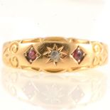 Edwardian 18 carat yellow gold ring inset with two small rubies and a rose cut diamond,