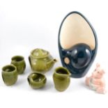 Holkham Pottery blue and cream lamp base, green glazed two person tea set, Wade pig.