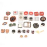 Quantity of vintage buckles and buttons, bakelite, plastic, enamel.