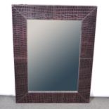 Modern leather framed wall mirror,