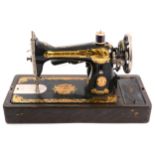 Singer electric portable sewing machine in case.