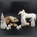 Beswick, Lladro, and other decorative figures.