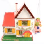 Swedish chalet doll's house and a Pelham Puppet,