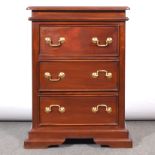 Contemporary hardwood three drawer chest, of small size.