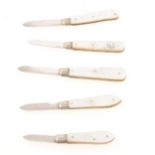 Five mother-of-pearl and silver folding fruit knives.