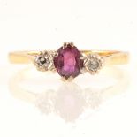 Ruby and diamond three stone ring.