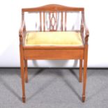 Edwardian inlaid mahogany piano chair, with a box seat.