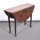 Mahogany drop leaf pad foot table.