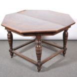 Oak drawleaf dining table with parquetry top and four ladderback chairs,