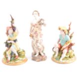 Pair of Capodimonte figures and another continental figure.