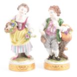 Two continental porcelain figures by Aelteste Volkstedter, with boxes and leaflets.