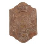 Embossed brass badge plate
