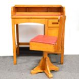 Child's beech roll top desk and chair.