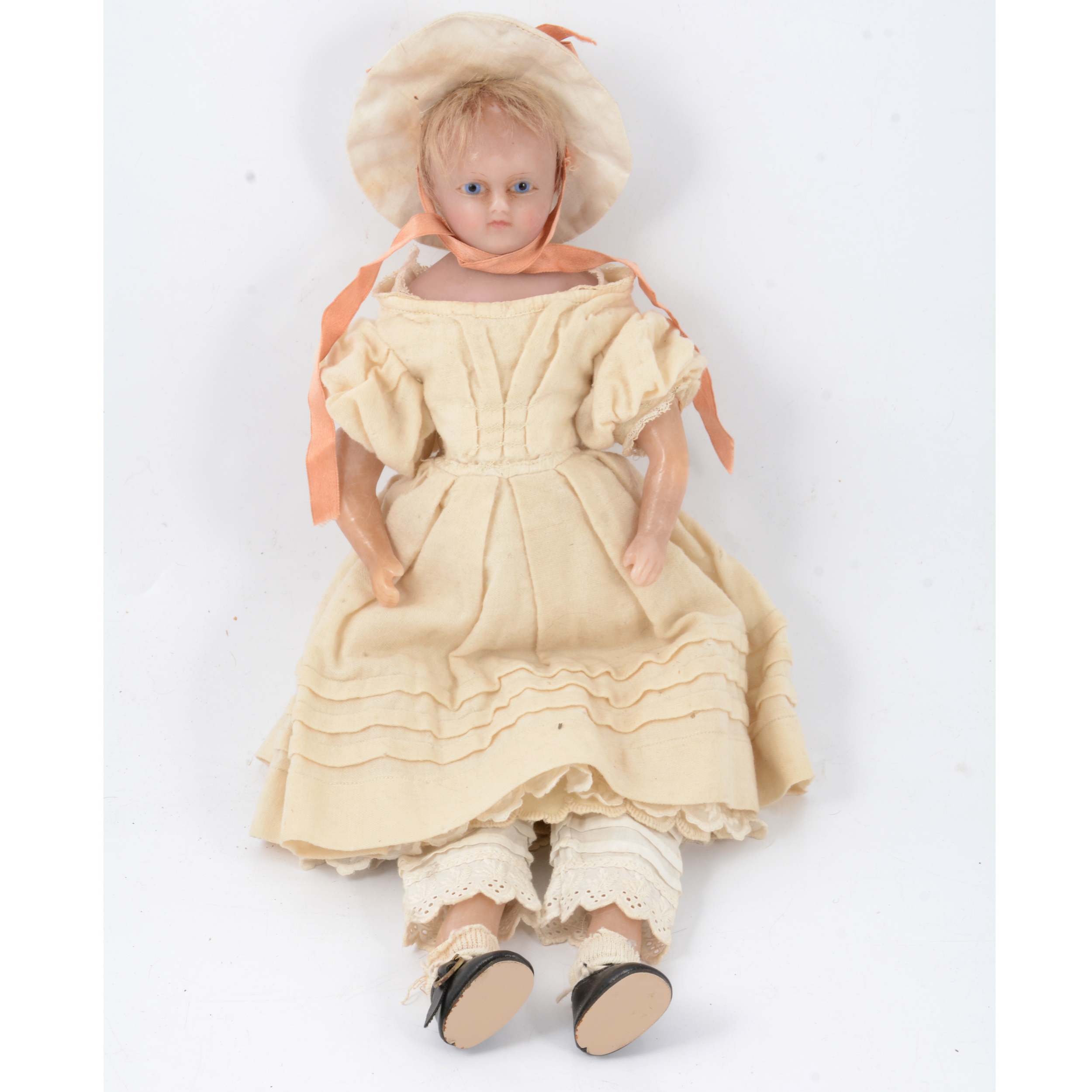 A Victorian poured wax doll, blue glass eyes, wax limbs, rag body, 37cm. - Image 2 of 2