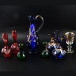 Seven items of late 19th century coloured glassware and a goblet