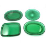 Quantity of green pressed glass plates, platters, etc