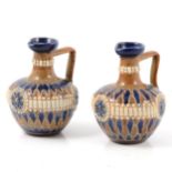 Pair of Doulton Lambeth stoneware jugs/ ewers
