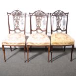 Three Edwardian stained walnut side chairs