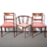 Pair of Victorian mahogany sabre leg dining chairs and an Edwardian corner chair