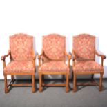 Set of eight oak framed elbow chairs