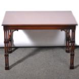 Reproduction mahogany coffee table in the style of a silver table