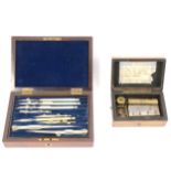 Metal and ivory mounted drawing set, marked Army & Navy, and a small musical box