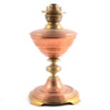 Victorian brass and copper oil lamp.