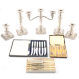 Set of five silver-plated candle holders and other plated wares.