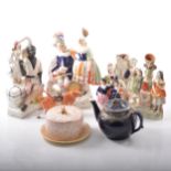 A Victorian Staffordshire figure group, "Uncle Tom and Eva", 18cm and other figures.