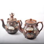 Five Measham Bargeware teapots and a milk jug.