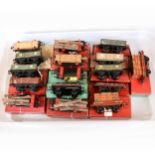 Sixteen Hornby O gauge model railway low and open wagons