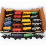 Twenty-Four Hornby O gauge model railway coal wagons, tipping wagons and cement wagons