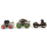 Three O gauge electric motor chassis.