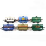 Six Hornby O gauge model railway tank wagons