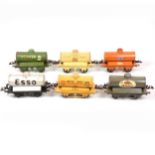 Six Hornby O gauge model railway tank wagons